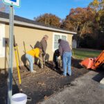 Working the Ground in Flower Bed #4 During 2022 Clean Up Day