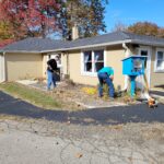 Close Up of Removing the Old Landscaping in Flower Bed #1 on 2022 Clean Up Day